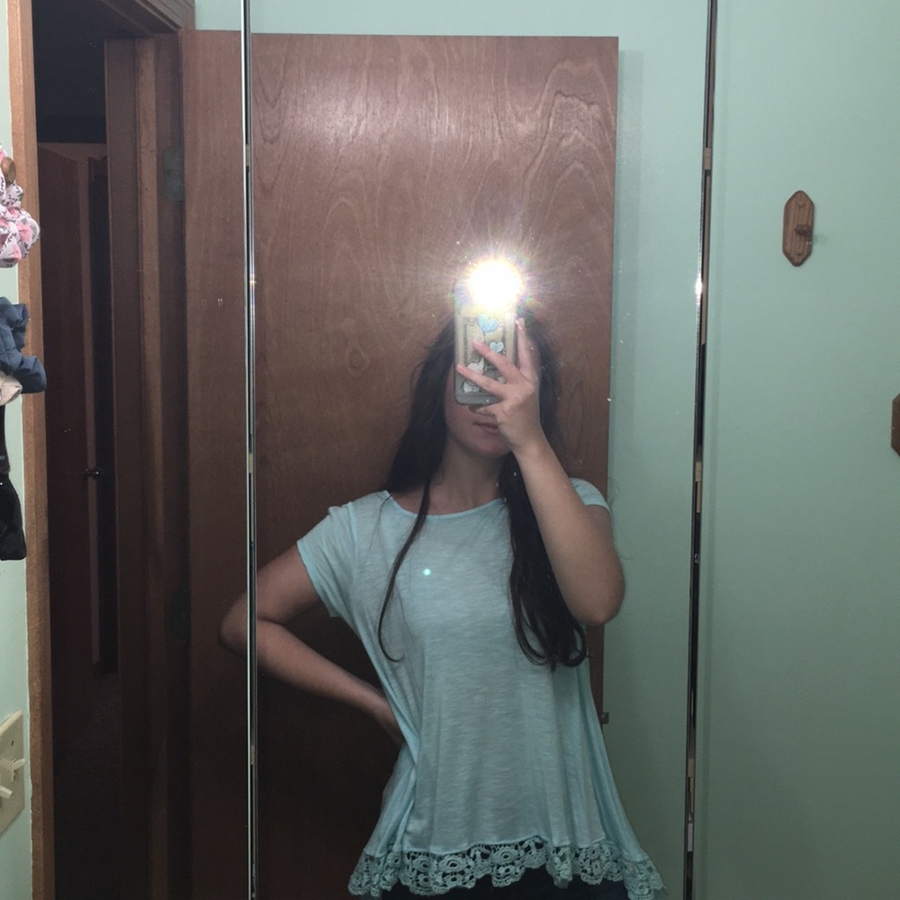 Light blue flowey top with lace detailing